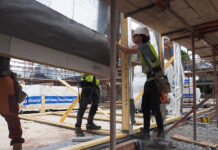 Better cooperation on offsite construction tipped to boost affordable housing delivery Prefabricated wooden trusses being installed on site
