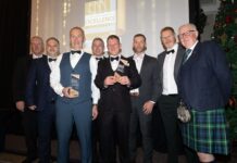 Double success for Orkney firms at national construction awards Construction award winners on stage