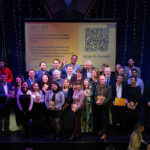 Accelerate to Zero Awards winners on stage