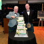 Highland housebuilder marks centenary by raising almost £40,000 for charity Sandy Adam (executive chairman of Springfield Group) and Kieran Graham (MD of Tulloch Homes)