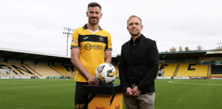 Livingston captain Ryan McGowan with JHE managing director Mark Heaney