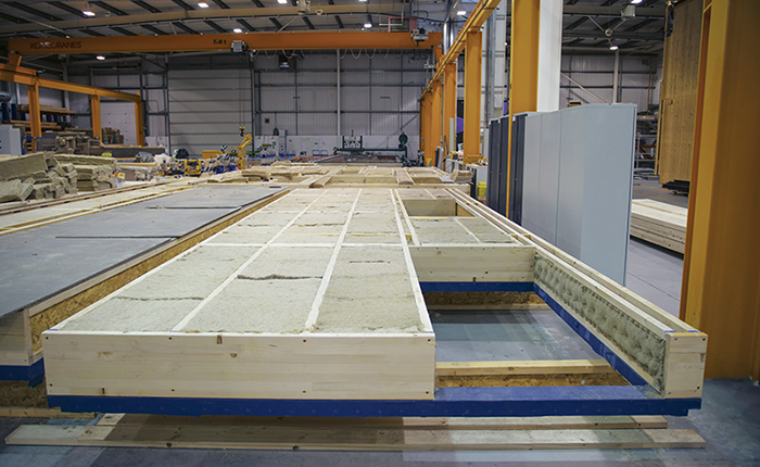 Panels with sustainable insulation being manufactured 