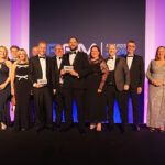 Robertson Facilities Management team collecting award