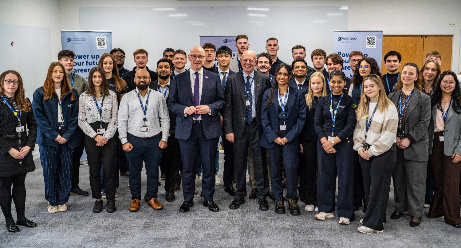 First minister John Swinney with SSEN Transmission MD Rob McDonald and graduates and trainees