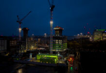 An illuminated crane at Central Quay