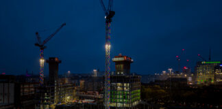 An illuminated crane at Central Quay