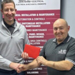 JHE Contracts Director Derek Menzies (left) presenting the award to Charlie Smillie