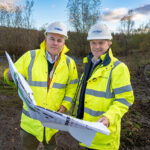 Housebuilder acquires brownfield site at ex-Clydesdale Steelworks Regional land director Arthur Mann (left) and regional operations director Andrew McArthur. Image credit: Peter Devlin
