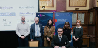 Scottish Water's Chris Arnold signing the AMC