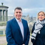 Allied Surveyors Scotland confirm promotions in Edinburgh commercial department Associate directors standing outside in Edinburgh