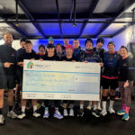 Charity challenge participants in boxing gym