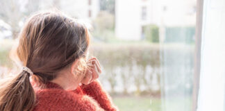 Child looking out the window
