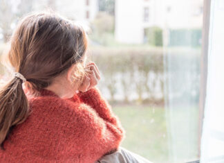 You can’t tackle child poverty without homes Child looking out the window