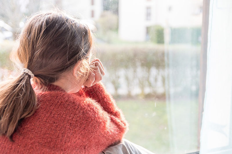Child looking out the window