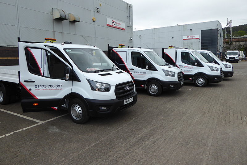 Fleet of vans parked up in a row