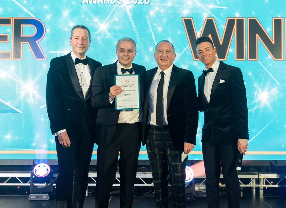 Les McAndrew receiving award