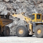 Mineral products being loaded into construction equipment