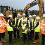 Attached image caption: Holding turf with Councillor McLellen and Councillor Greig are Hazlehead Pupils Ozi, Robert and Chloe watched by Kevin Dickson, (Robertson Group) Scott Brown, (Robertson Project Director) James Purdie, Headteacher at Hazlehead Academy and John McHardy, Project manager from hub North Scotland.