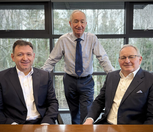 Robertson appoints new chairman as founder steps back from daily involvement L-R: Elliot Robertson, Sir Bill Robertson, John Watson