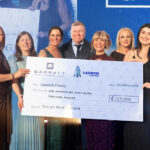 Barratt representatives with large cheque for charity Launch Foods