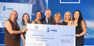 Barratt representatives with large cheque for charity Launch Foods