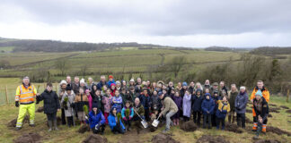 Group photo at Centenary Forest planting event