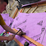 Roofing apprentice in training