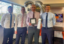 John Mooney presented with gift on his retirement