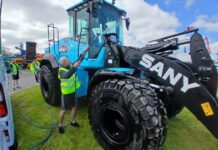Construction machine being cleaned