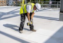 Roofing boards being installed