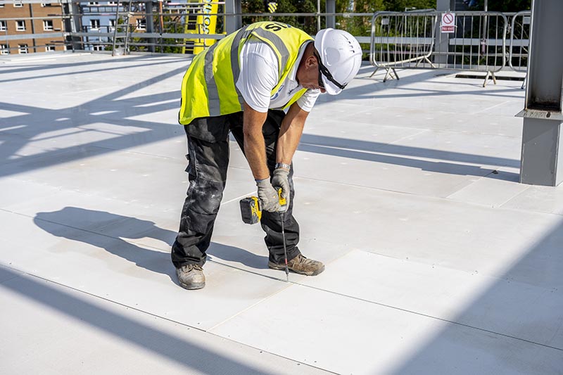 Roofing boards being installed