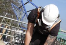 Roofer carrying out work