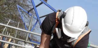 Roofer carrying out work