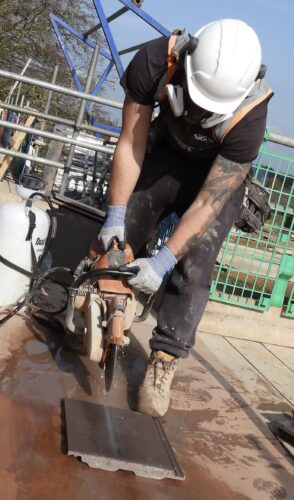 Roofer carrying out work