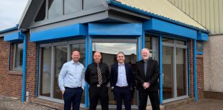 Caledonia directors outside the Dundee office