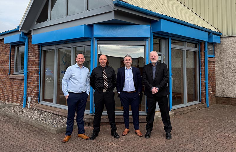 Caledonia directors outside the Dundee office