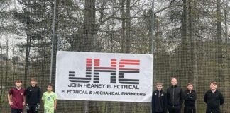 John Heaney (Electrical) Ltd MD Mark Heaney with young footballers