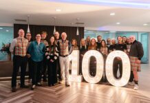 Mactaggart and Mickel team gathering to mark reaching the £100,000 fundraising target