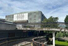 Mural intact on the side of Hector McNeil House, Greenock, before its removal.