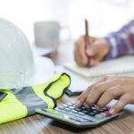 Construction retentions: why reform is the way ahead in Scotland Calculator and construction equipment. Image credit: Shutterstock