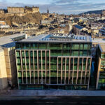 Edinburgh office building with castle in background