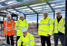 Milestone reached on build of business park at Oban Airport Ian Phillips, Regional Managing Director, Robertson Construction Northern; Andrew Collins, Project Manager, Argyll and Bute Council; Cllr Jim Lynch Leader of the Council, Argyll and Bute Council; Fergus Murray, Head of Development and Economic Growth, Argyll and Bute Council; Scott Adams, Project Director, hub North.