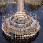 Craft apprentices gain timber harvesting experience on specialist project Hundreds of larch trees were felled by hand to meet the requirements of the crannog reconstruction. Image: Andrew Allan