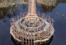 Hundreds of larch trees were felled by hand to meet the requirements of the crannog reconstruction. Image: Andrew Allan