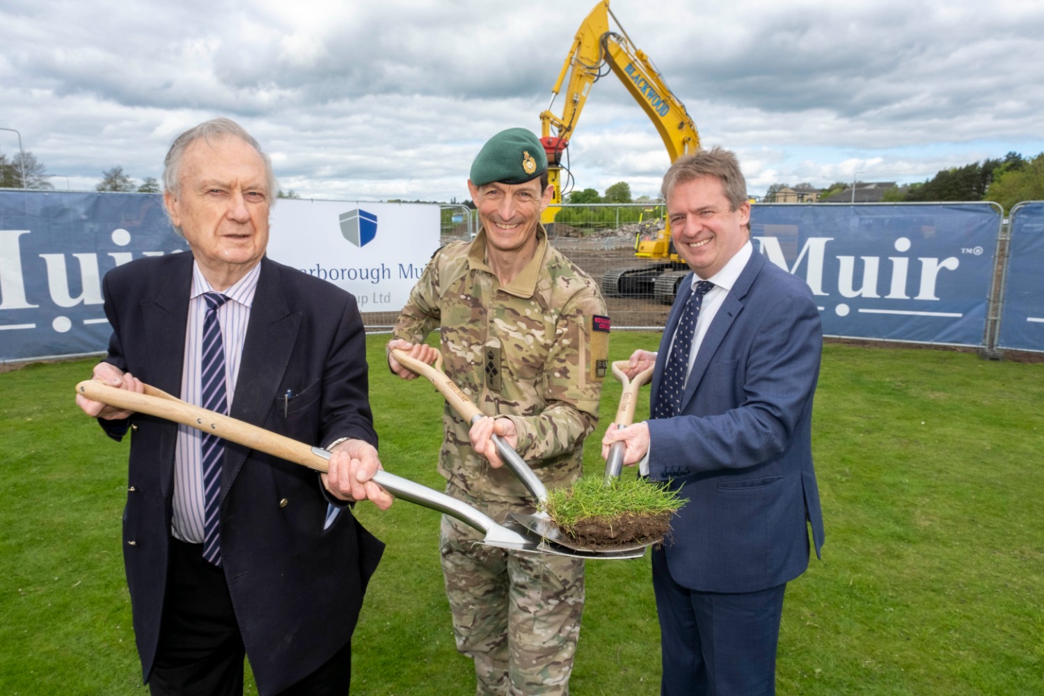 L-R: John Muir, Chairman and Founder, Muir Group; Brigadier Andrew Muddiman, Naval Regional Commander Scotland & Northern Ireland, Ministry of Defence; and Graeme Downie MP