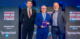 Bracewell on stage receiving award