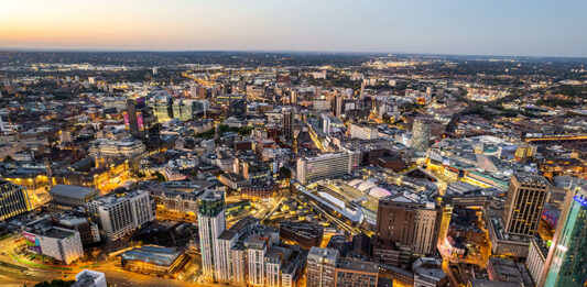 Construction sector urged to adopt ‘measured response’ to geopolitical uncertainty Aerial view of city