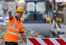 Construction worker managing traffic