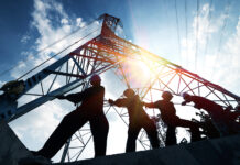 Scotland’s construction leaders state key aims for incoming government silhouette workers on background of construction