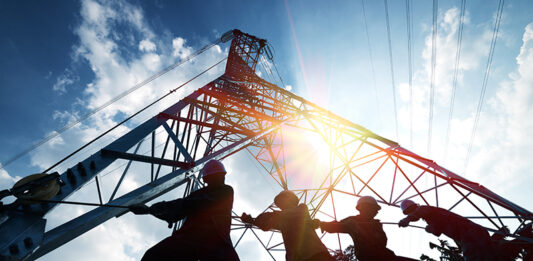 Scotland’s construction leaders state key aims for incoming government silhouette workers on background of construction